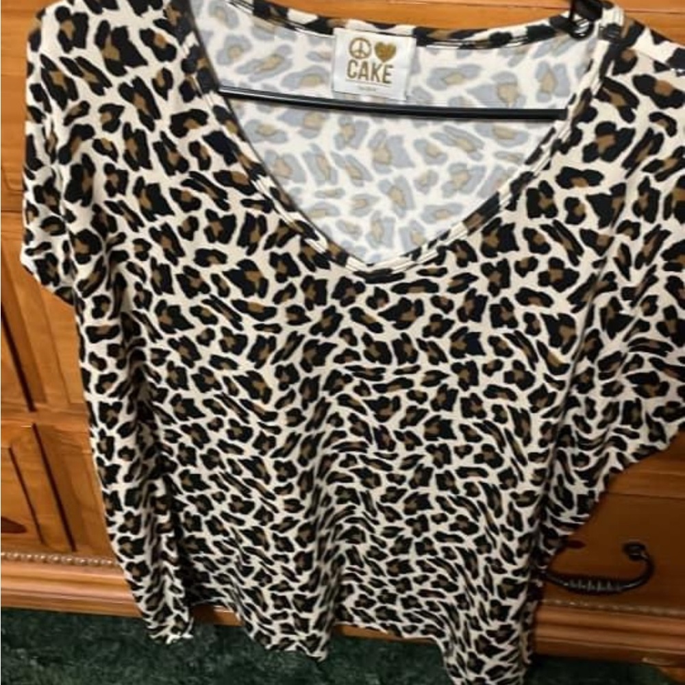 Peace Love Cake leopard tshirt. Very, very soft.  Size Medium. But fits big.